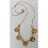 A 9ct gold citrine drop necklace, length of chain 42cm, weight 9.5gms Condition Report: Available