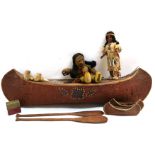 A Norah Welling Native American plush velvet doll, a Native American doll by Carlson, canoe etc