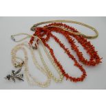 Strings of coral beads, pastel coloured pearls with a 9ct gold clasp and other items Condition