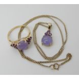 A 14k gold lilac hardstone and amethyst ring size R1/2 with matching pendant and 9ct chain, combined