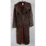 Four fur coats and a faux fur jacket Condition Report: Available upon request