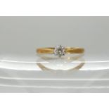 An 18ct gold diamond solitaire ring of estimated approx 0.15cts, finger size N, weight 2.6gms