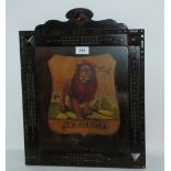 A painted Red Lion hardwood panel in shaped frame, 47 x 37cm overall Condition Report: Available