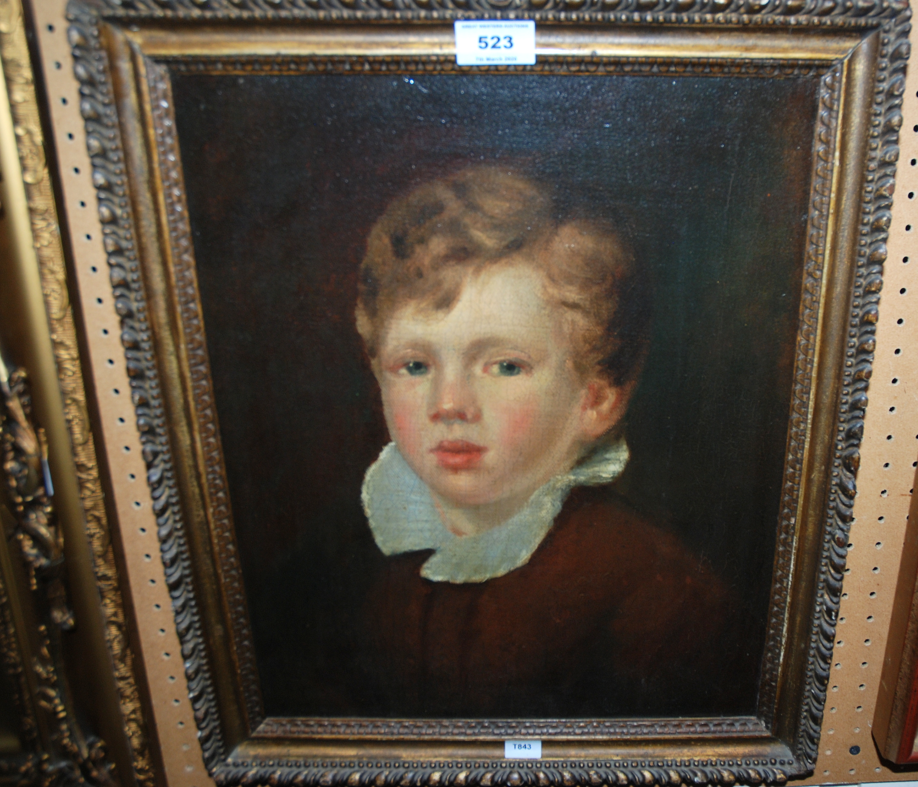 BRITISH SCHOOL Portrait of a young boy, head and shoulders, oil on canvas, 42 x 33cm Condition