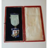 A silver-gilt and enamel Excelsior Engineers Lodge medal with ribbon and bar, another example, 9ct