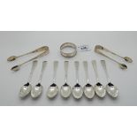 A lot comprising eight silver coffee spoons with tongs, Sheffield 1936, a pair of tongs and a silver