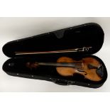 A single piece backed violin 35.5cm bearing label to the interior Spiritus Sursano con 1717 with a