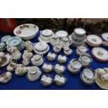 An extensive Royal Doulton Sherbrooke dinner service comprising eleven dinner plates, twelve