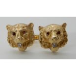 A PAIR OF TIGER'S HEAD CUFFLINKS stamped 14k to the reverse and to the clips. An estimated approx