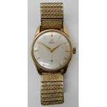 A 9CT GOLD OMEGA WATCH HEAD with gold plated expanding strap, diameter of the case 3.3cm, the
