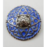 A SILVER AND BLUE ENAMEL ALEXANDER RITCHIE SHIELD BROOCH with both 'cast in' IONA AR, and stamped