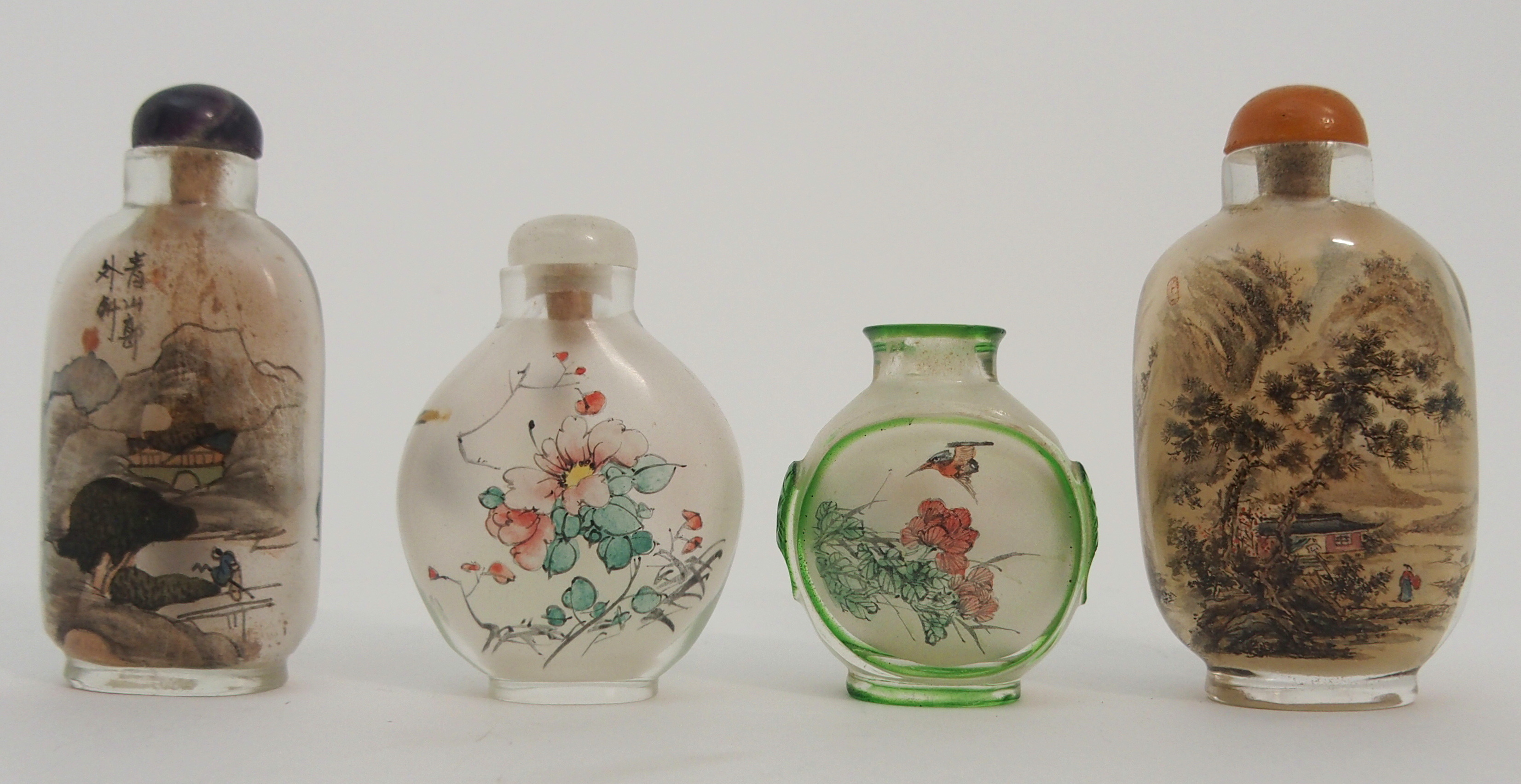 FOUR CHINESE DECORATED GLASS SNUFF BOTTLES one with a river landscape, scholar and attendant, 7cm - Image 3 of 3