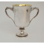 A LATE GEORGE III SILVER TROPHY CUP maker's marks unclear, Birmingham 1811, of cylindrical form with