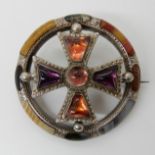 A SCOTTISH AGATE INLAID BROOCH with unusual swivel fitting so the central cross can either show