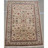 A CREAM GROUND FINE KESHAN with allover floral design, 190cm x 135cm Condition Report: Available