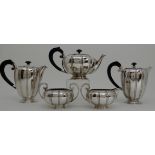 A FIVE PIECE SILVER TEA AND COFFEE SERVICE by Robert Edgar Stone, London 1956, of tapering