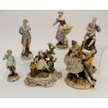 TWO MEISSEN MUSICAL THEMED FIGURES one of lady playing a cello with a lamb at her feet 15.5cm