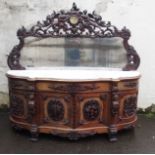 A GERMAN SIDEBOARD OF NEO CLASSICAL DESIGN with a single carved frieze drawer over a pair of