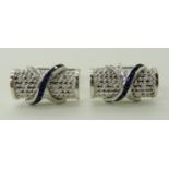 A PAIR OF 14K WHITE GOLD DIAMOND AND BLUE GEM CUFFLINKS dimensions of the head 2.1cm x 1.1cm, weight