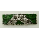 A CHINESE GREEN HARDSTONE AND DIAMOND BROOCH made in white metal throughout, with flower carved