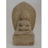 AN INDIAN WHITE MARBLE MODEL OF BUDDHA seated in lotus position and holding a vessel, with carved
