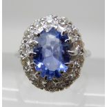 AN 18CT WHITE GOLD CORNFLOWER BLUE SAPPHIRE AND DIAMOND RING the sapphire's approx dimensions are