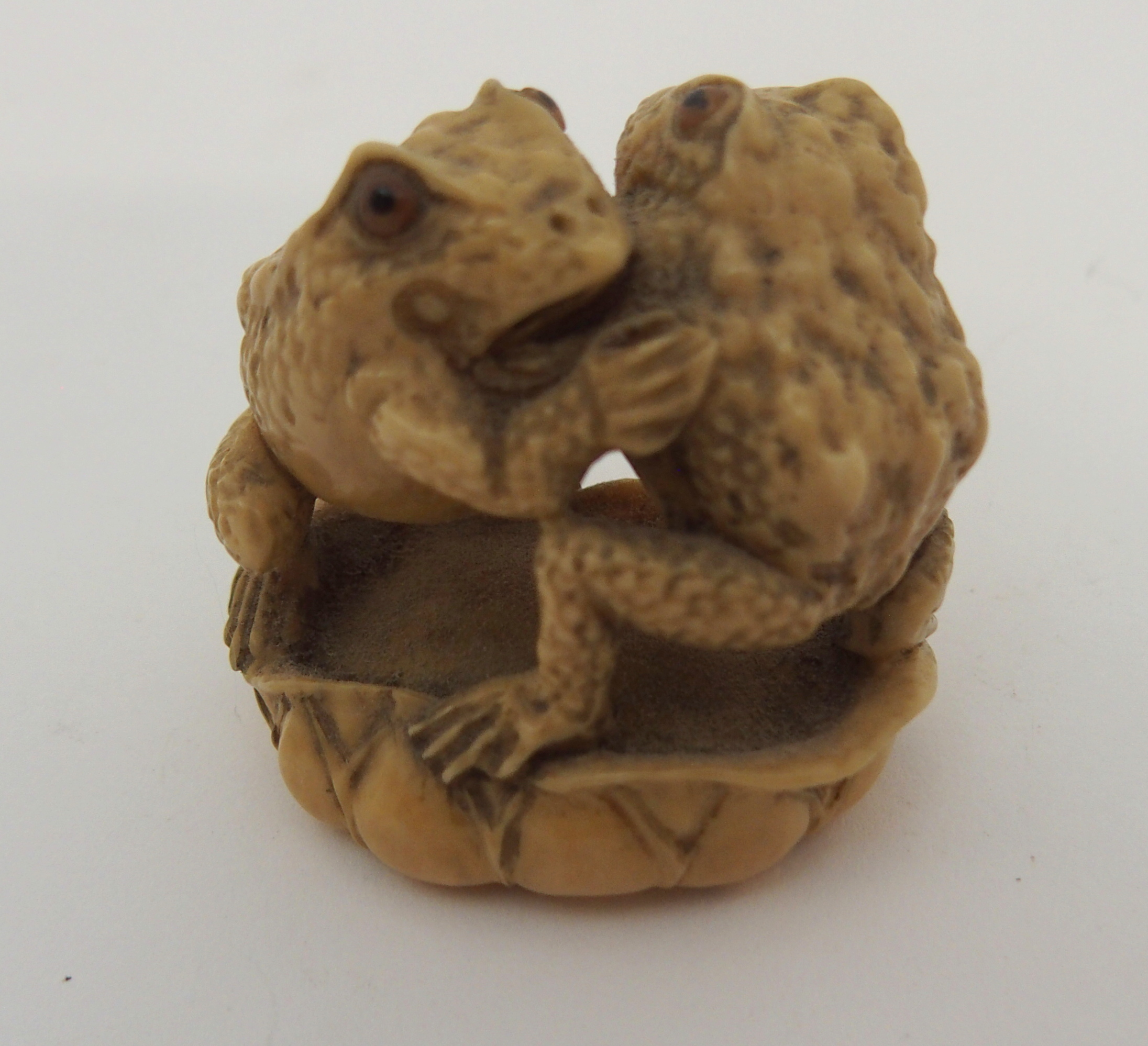 THREE JAPANESE IVORINE NETSUKE one as a rat holding a nut, signed, 3cm high, another chewing tail, - Image 3 of 7