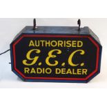 A BLUE-PAINTED METAL AND GLASS G.E.C. RADIO DEALER ADVERTISING SIGN one panel lacking with hanging