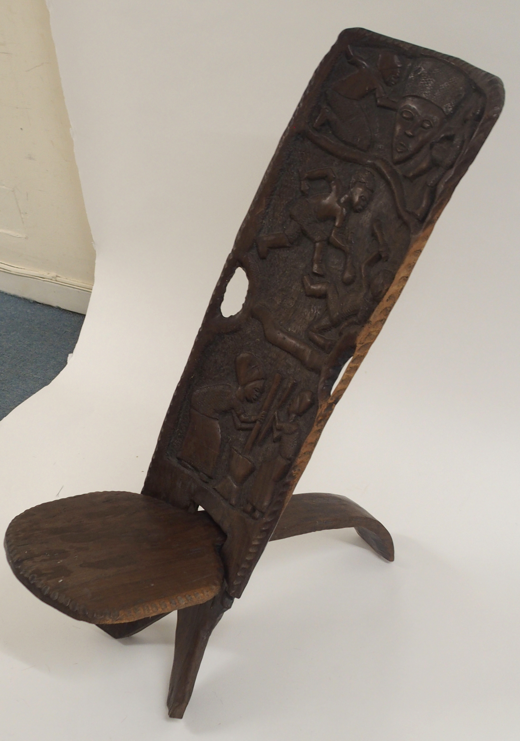 AN AFRICAN CARVED BIRTHING CHAIR the back with face mask flanked by two figures, above two women - Image 11 of 11