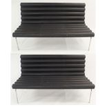 A PAIR OF SERGE CHERMAYEFF (1900 - 1996) STYLE BENCHES with a fret leather tubed effect seat and