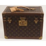 A LOUIS VUITTON MONOGRAM RECTANGULAR VANITY CASE the fitted interior with an additional mirrored