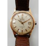 A GOLD PLATED OMEGA AUTOMATIC CONSTELLATION CALENDAR WATCH with cream dial, gold coloured baton