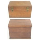 A 19TH CENTURY TEAK TIN LINED TRUNK the hinged cover with heavy brass clasps and handles, 51cm