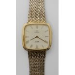 A GOLD PLATED OMEGA DE VILLE QUARTZ WRISTWATCH with cream dial and gold coloured Roman numerals,