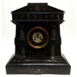 A LARGE SLATE AND GREEN MARBLE MANTLE CLOCK of classical portico design with partial skeletal