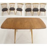 A LIGHT ERCOL ELM DROP-LEAF DINING TABLE 71cm high x 135cm wide x 71cm deep with six stick back