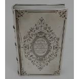 A SILVER CIGARETTE BOX maker's marks JM, Glasgow 1862, modelled as a book, the hinged cover with