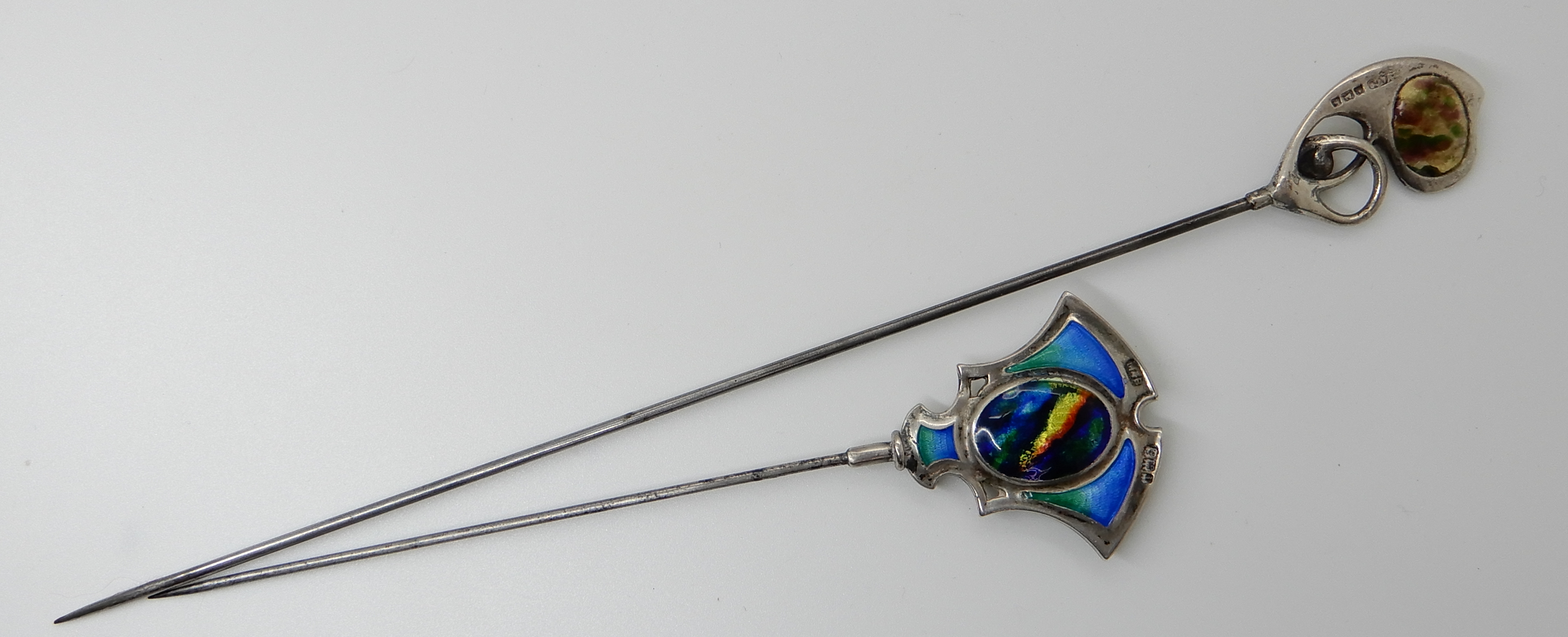 TWO SILVER AND ENAMEL ART NOUVEAU HATPINS enamelled in purple and green hallmarked for Birmingham - Image 2 of 2