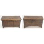AN OAK COFFER the hinged single plank top above a flowerhead and scrolling foliate front, with