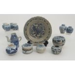 A GROUP OF CHINESE PROVINCIAL BLUE AND WHITE comprising; eight small vases, 4.5cm to 6cm high,