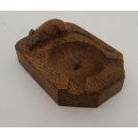 A ROBERT MOUSEMAN THOMPSON OF KILBURN OAK ASHTRAY with carved mouse signature, 10 x 7.5cm