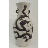 A CHINESE CRACKLEWARE BALUSTER VASE applied with sinuous dragons chasing the pearl of wisdom, flying