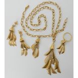 A SUITE OF ARABIC GOLD JEWELLERY all bearing the stamp 21k, with textured panel drops, comprising of