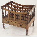 A 19TH CENTURY CANTERBURY the three section rack above a narrow drawer and joined by baluster turned
