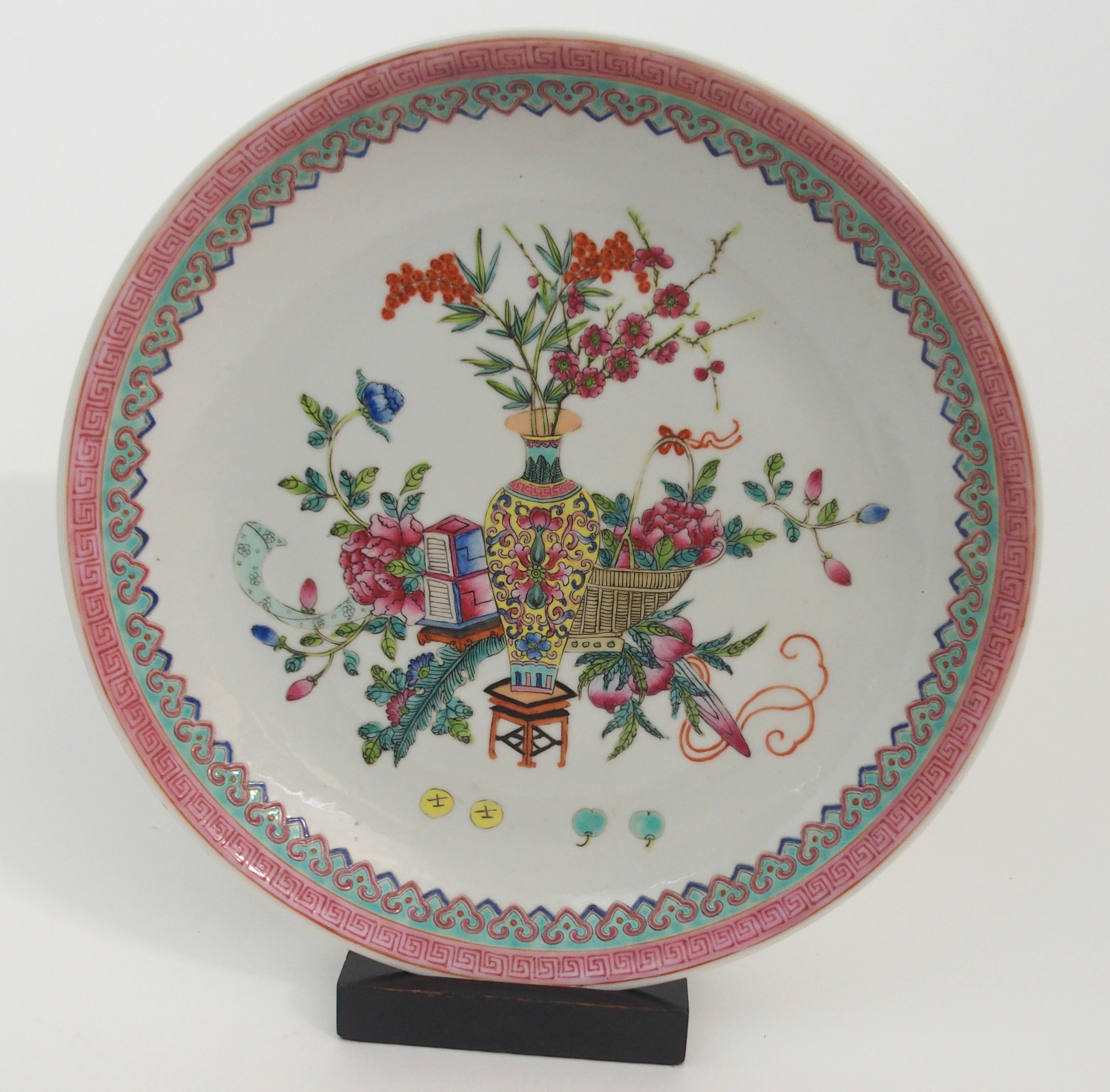 A CHINESE FAMILLE ROSE DISH painted with precious objects within a key and ruji head border, 32. - Image 2 of 8