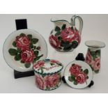 A COLLECTION OF WEMYSS WARE IN CABBAGE ROSE PATTERN comprising a biscuit pot and cover, 11cm high, a