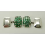 A PAIR OF WHITE METAL EMERALD AND DIAMOND CUFFLINKS stamped 750, pave set with square cut