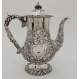 A GEORGE IV SILVER COFFEE POT by Thomas and John Settle, Sheffield 1821, of baluster form with
