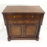 A VICTORIAN WALNUT CABINET with two short above one long drawer and in pair of panelled doors with
