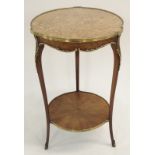 A FRENCH ROSEWOOD AND GILT METAL MOUNTED OCCASIONAL TABLE with marble top above a shaped apron on